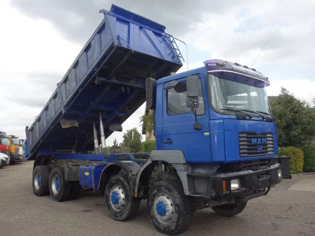 MAN 35.414 8x8 meiller kipper manual diesel pomp - شاحنة قلاب: صورة 1 MAN 35.414 8x8 meiller kipper manual diesel pomp - شاحنة قلاب: صورة 1