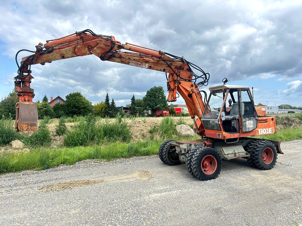Atlas MOBILBAGGER 1302 E - حفارة دولاب: صورة 1 Atlas MOBILBAGGER 1302 E - حفارة دولاب: صورة 1