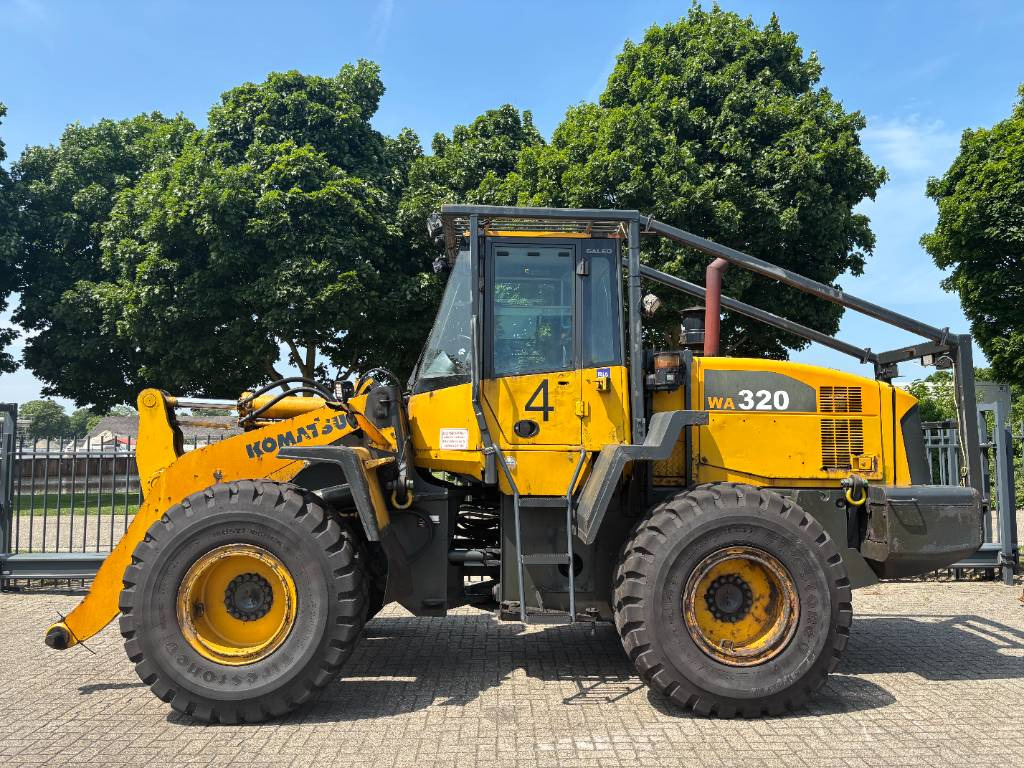 Komatsu WA 320-5 - اللودر بعجل: صورة 1 Komatsu WA 320-5 - اللودر بعجل: صورة 1