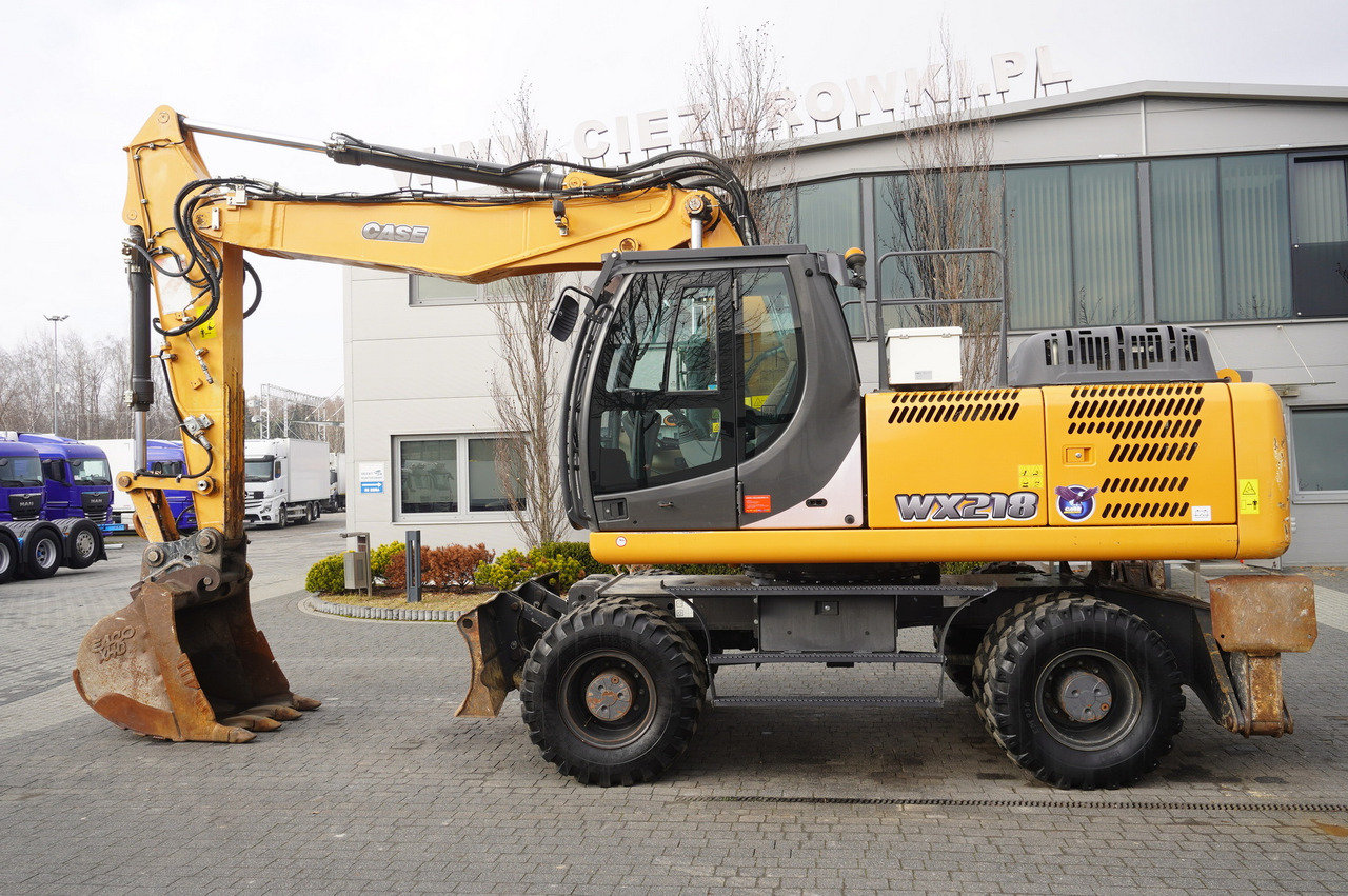 CASE WX218 / 23t wheeled excavator / 3 times folding arm - حفارة دولاب: صورة 1 CASE WX218 / 23t wheeled excavator / 3 times folding arm - حفارة دولاب: صورة 1