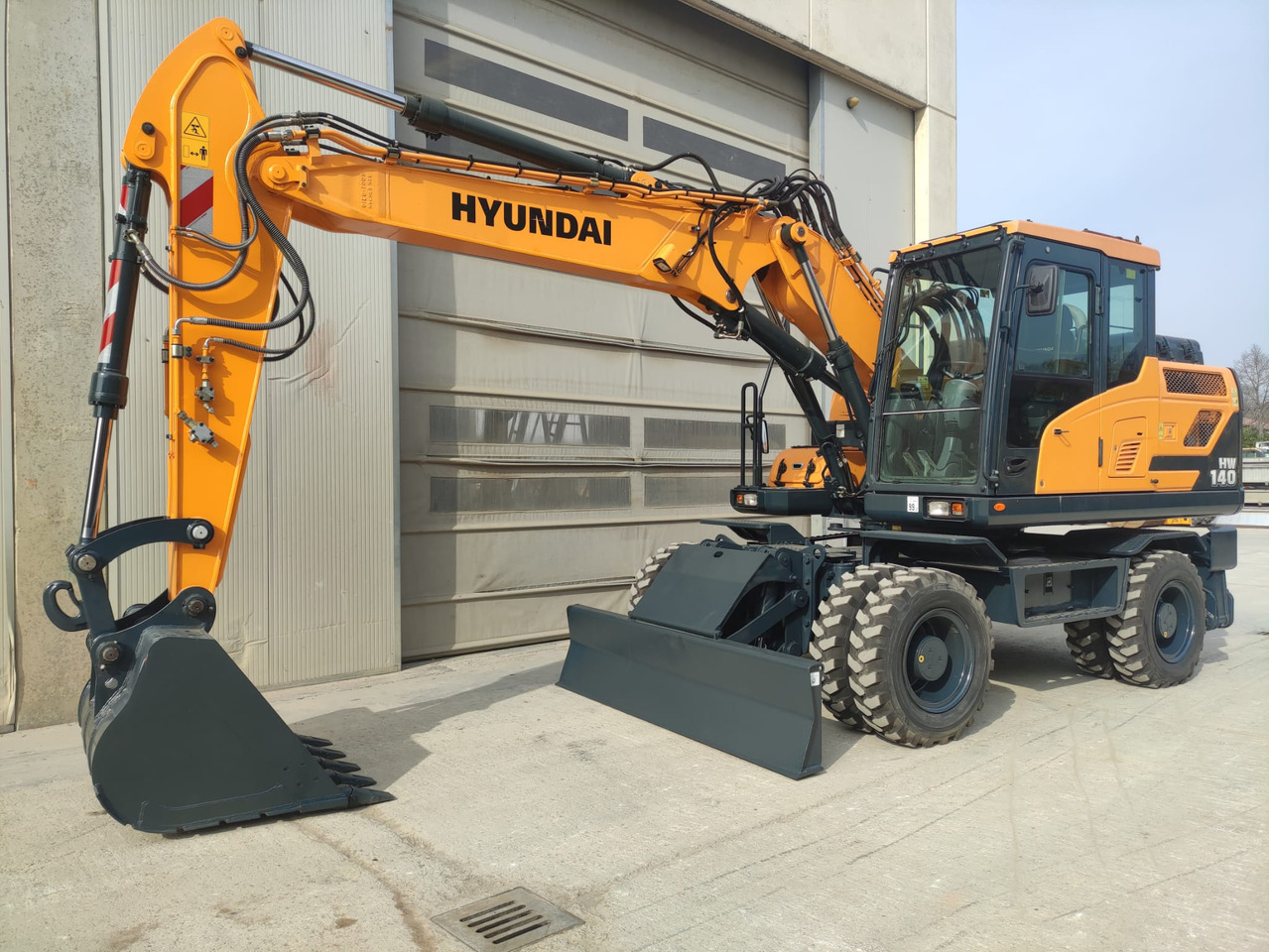 HYUNDAI HW140 - حفارة دولاب: صورة 1 HYUNDAI HW140 - حفارة دولاب: صورة 1