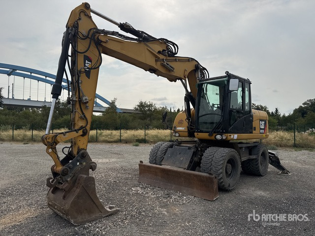 2012 Cat M313D Pelle Sur Pneus Wheel Excavator - حفارة دولاب: صورة 1 2012 Cat M313D Pelle Sur Pneus Wheel Excavator - حفارة دولاب: صورة 1