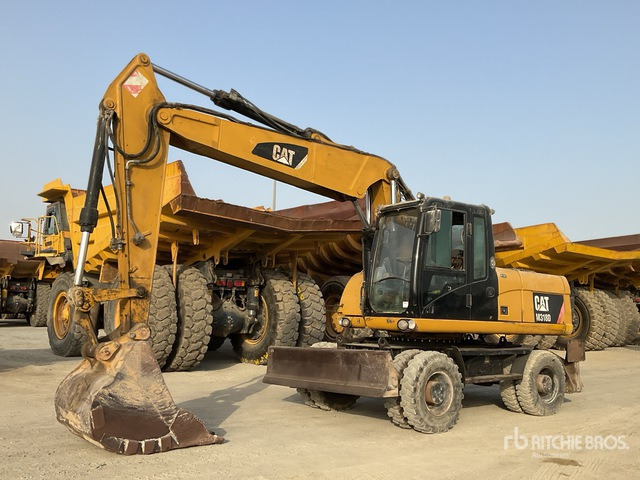 2012 Cat M318D - حفارة دولاب: صورة 2 2012 Cat M318D - حفارة دولاب: صورة 2