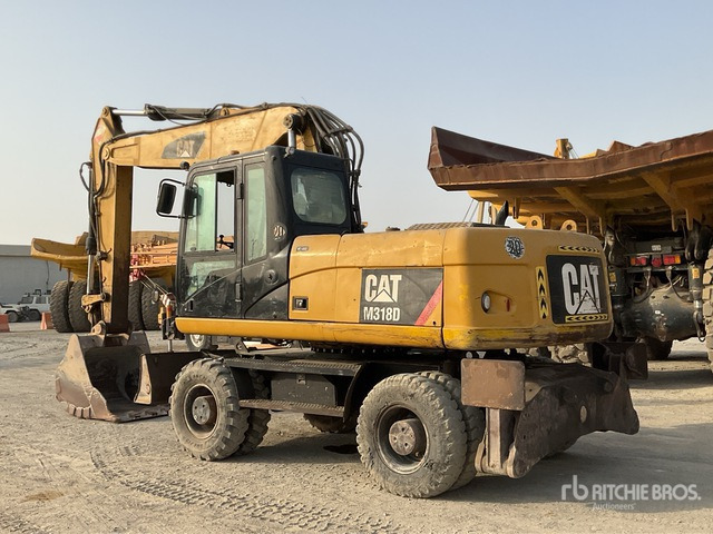 2012 Cat M318D - حفارة دولاب: صورة 4 2012 Cat M318D - حفارة دولاب: صورة 4