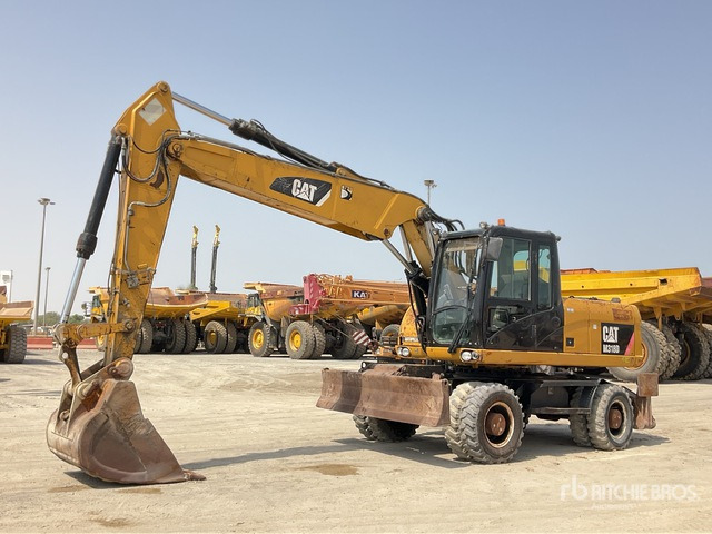 2012 Cat M318D - حفارة دولاب: صورة 1 2012 Cat M318D - حفارة دولاب: صورة 1