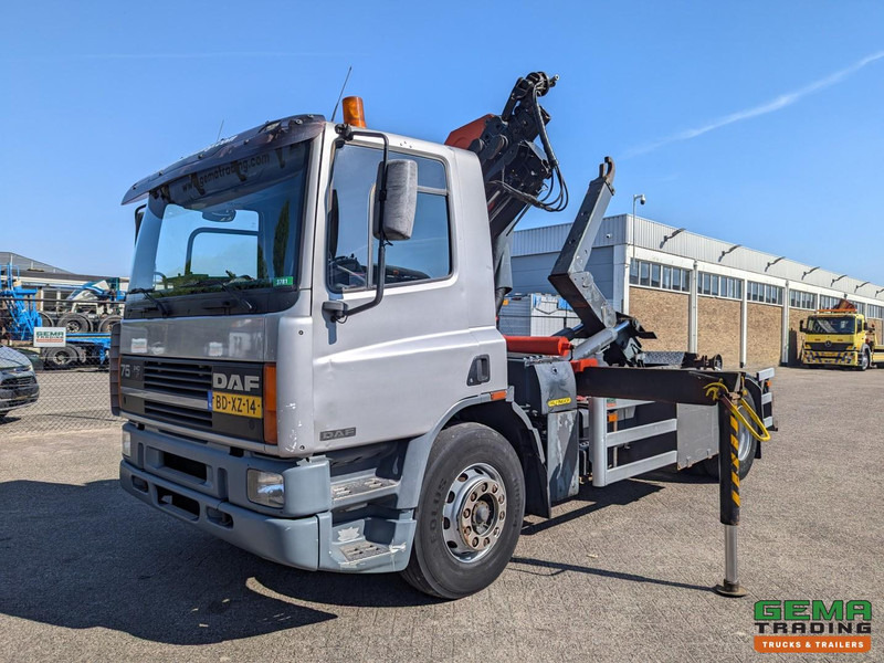DAF 75.240 4x2 Dagcab Euro1 - Haakarm 14T + Palfinger PK11000 - Afstandsbediening - شاحنة ذات خطاف, شاحنة كرين: صورة 1 DAF 75.240 4x2 Dagcab Euro1 - Haakarm 14T + Palfinger PK11000 - Afstandsbediening - شاحنة ذات خطاف, شاحنة كرين: صورة 1