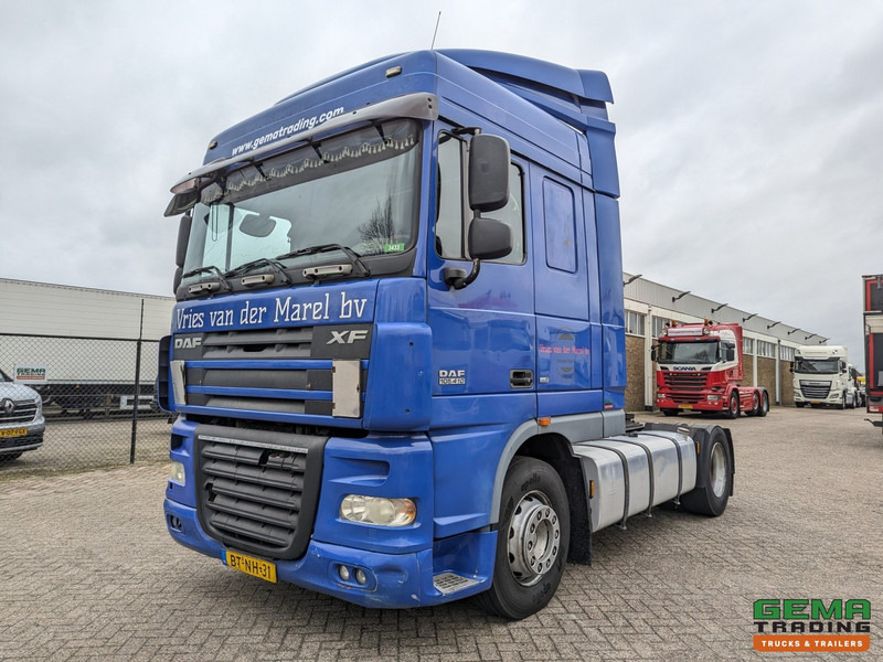 DAF FT XF105.410 4x2 Spacecab Euro5 - Handgeschakeld - NL truck - وحدة جر: صورة 1 DAF FT XF105.410 4x2 Spacecab Euro5 - Handgeschakeld - NL truck - وحدة جر: صورة 1