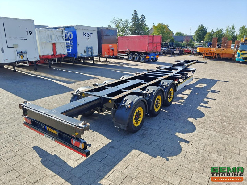 Kögel PORT 40 SIMPLEX 20 3-Assen SAF - Schijfremmen - 20/30/40FT Aansluiting - Achterschuiver - نصف مقطورة لنقل الحاويات: صورة 1 Kögel PORT 40 SIMPLEX 20 3-Assen SAF - Schijfremmen - 20/30/40FT Aansluiting - Achterschuiver - نصف مقطورة لنقل الحاويات: صورة 1