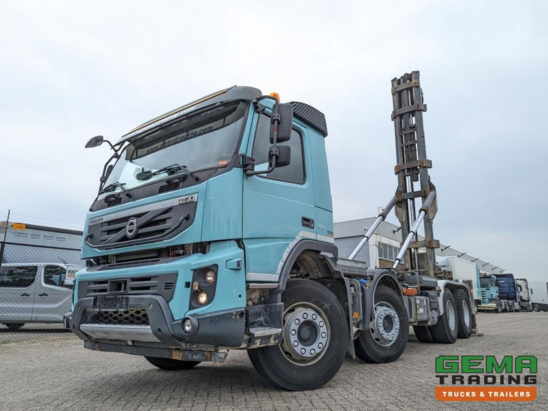 Volvo FMX410 8x4 /4 Daycab Euro5 - Haakarm 25T - CementSilo - RadioGrafisch - Hydr. Steunpoten - NaafReductie - شاحنة ذات خطاف: صورة 1 Volvo FMX410 8x4 /4 Daycab Euro5 - Haakarm 25T - CementSilo - RadioGrafisch - Hydr. Steunpoten - NaafReductie - شاحنة ذات خطاف: صورة 1