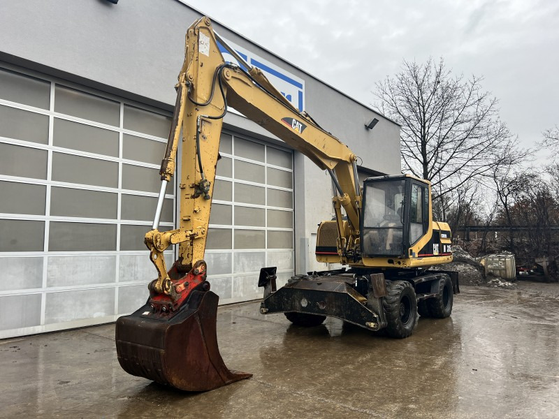 Caterpillar M 315 (111063) - حفارة دولاب: صورة 2 Caterpillar M 315 (111063) - حفارة دولاب: صورة 2