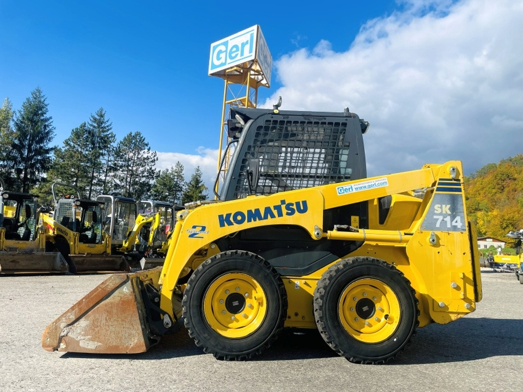 Komatsu SK714 (4077) - شيول صغير: صورة 1 Komatsu SK714 (4077) - شيول صغير: صورة 1