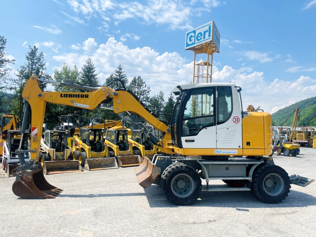 Liebherr A910 Compact (4025) - حفارة دولاب: صورة 1 Liebherr A910 Compact (4025) - حفارة دولاب: صورة 1