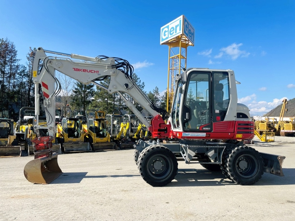 Takeuchi TB295W (3964) - حفارة دولاب: صورة 1 Takeuchi TB295W (3964) - حفارة دولاب: صورة 1