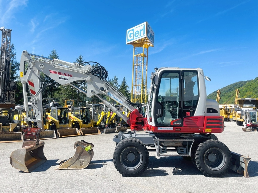 Takeuchi TB295W (4045) - حفارة دولاب: صورة 1 Takeuchi TB295W (4045) - حفارة دولاب: صورة 1
