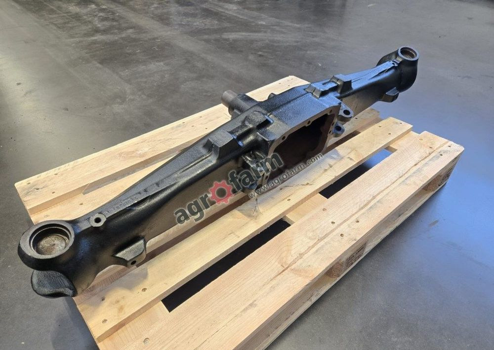 Obudowa przedniego mostu, New Holland L75, TL - نقل الحركة: صورة 2 Obudowa przedniego mostu, New Holland L75, TL - نقل الحركة: صورة 2