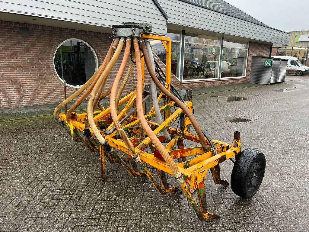 Hekamp 11 tand bouwland bemester  - آلة رش السماد الطبيعي: صورة 1 Hekamp 11 tand bouwland bemester  - آلة رش السماد الطبيعي: صورة 1