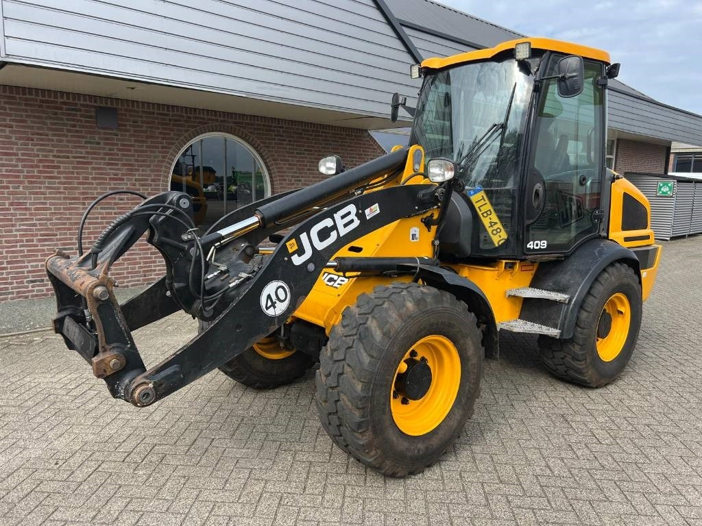 JCB 409 Agri shovel - اللودر بعجل: صورة 1 JCB 409 Agri shovel - اللودر بعجل: صورة 1