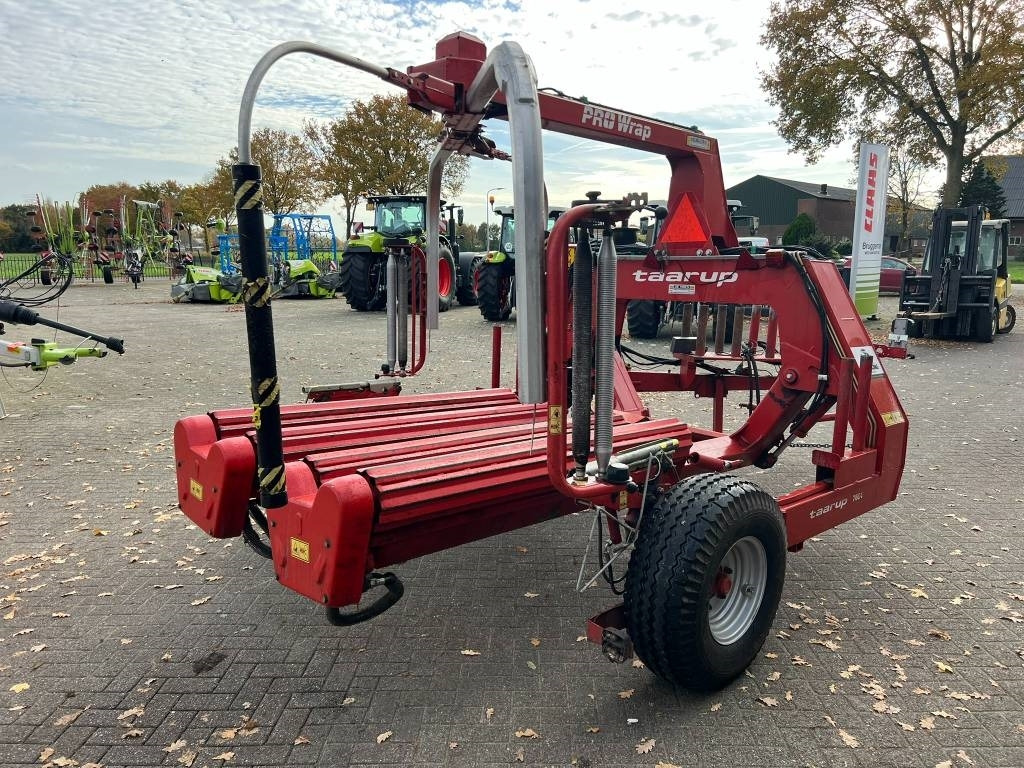 Kverneland Taarup 7664 - آلة تغليف بالة التبن: صورة 5 Kverneland Taarup 7664 - آلة تغليف بالة التبن: صورة 5