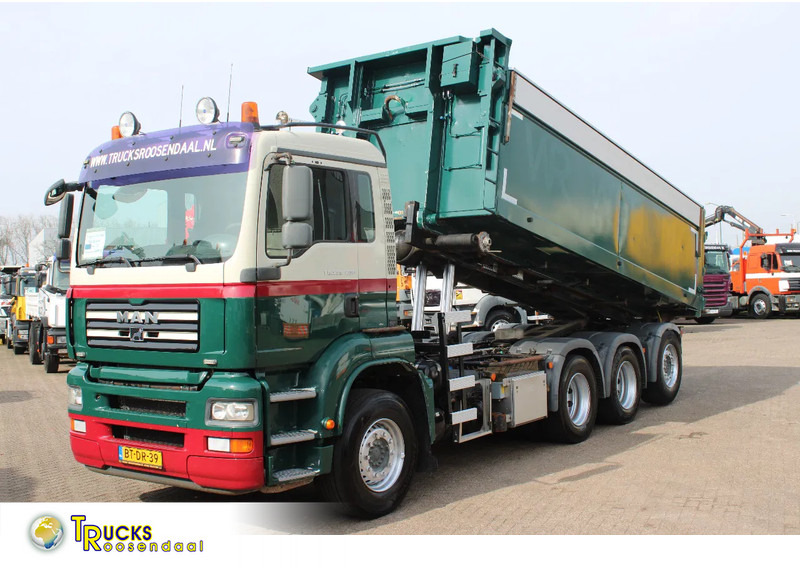 MAN TGA 35.400 8X4 + MANUAL! + NCH kipper/ bitum sprayer - شاحنة - نظام الكابلات: صورة 1 MAN TGA 35.400 8X4 + MANUAL! + NCH kipper/ bitum sprayer - شاحنة - نظام الكابلات: صورة 1
