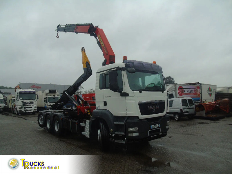 MAN TGS 35.440 + PALFINGER 24500 + 8X4 + EURO 5 + REMOTE - شاحنة ذات خطاف, شاحنة كرين: صورة 1 MAN TGS 35.440 + PALFINGER 24500 + 8X4 + EURO 5 + REMOTE - شاحنة ذات خطاف, شاحنة كرين: صورة 1