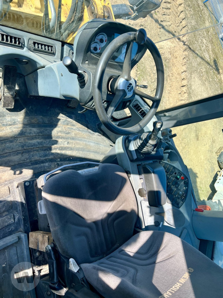 اللودر بعجل New Holland W 170 B: صورة 12