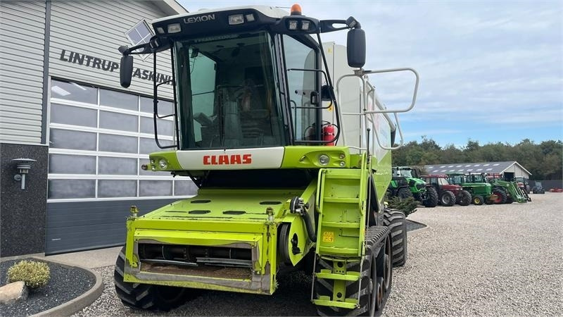Claas LEXION 560 Med ny bælter og 4wd - حصادة موحَّدة: صورة 3 Claas LEXION 560 Med ny bælter og 4wd - حصادة موحَّدة: صورة 3