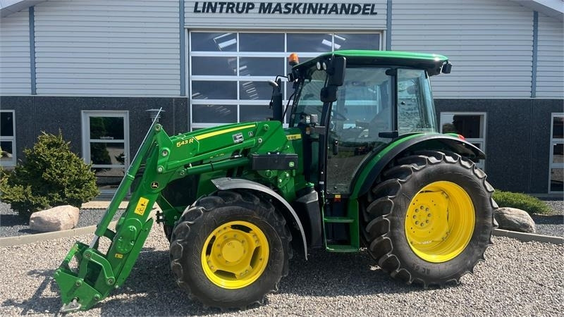 John Deere 5115M Med frontlæsser, som ny - جرار: صورة 1 John Deere 5115M Med frontlæsser, som ny - جرار: صورة 1