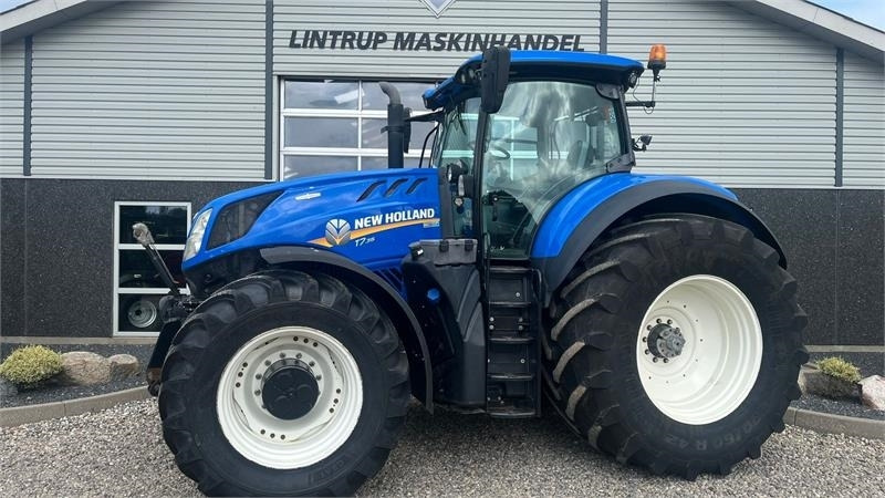 New Holland T7.315 HD med frontlift og front PTO, samt NYE 650 - جرار: صورة 1 New Holland T7.315 HD med frontlift og front PTO, samt NYE 650 - جرار: صورة 1