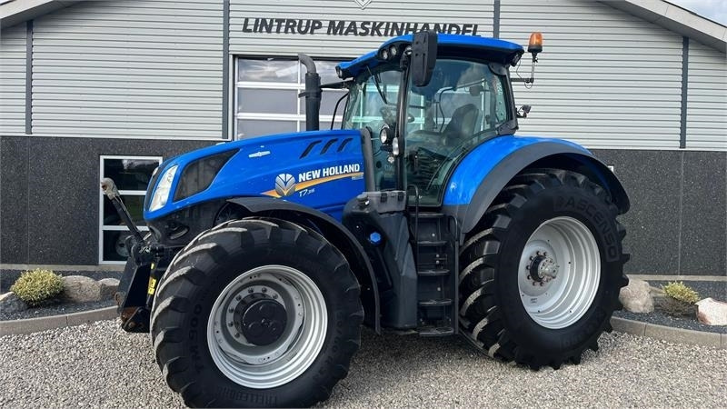 New Holland T7.315 HD med frontlift og front PTO. - جرار: صورة 1 New Holland T7.315 HD med frontlift og front PTO. - جرار: صورة 1