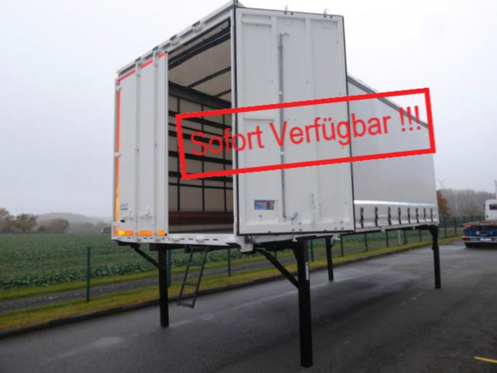 Krone Heck mit Portaltüren - حاوية قابلة للتبديل ستارة جانبية: صورة 1 Krone Heck mit Portaltüren - حاوية قابلة للتبديل ستارة جانبية: صورة 1