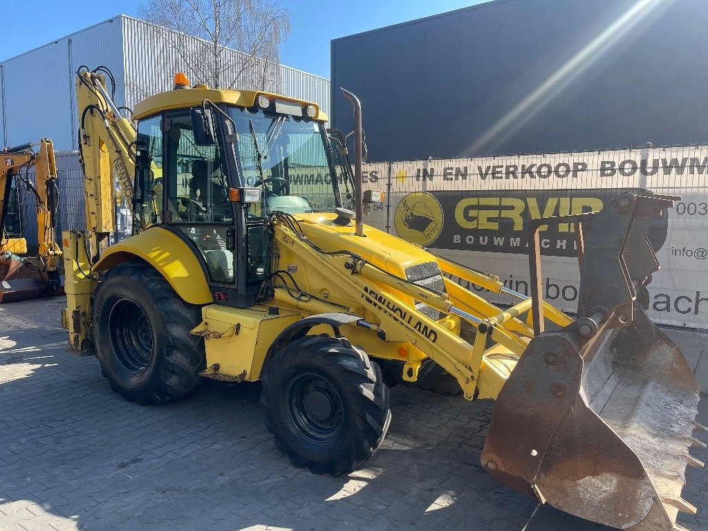 New Holland LB 110 - جرافة حفار: صورة 1 New Holland LB 110 - جرافة حفار: صورة 1