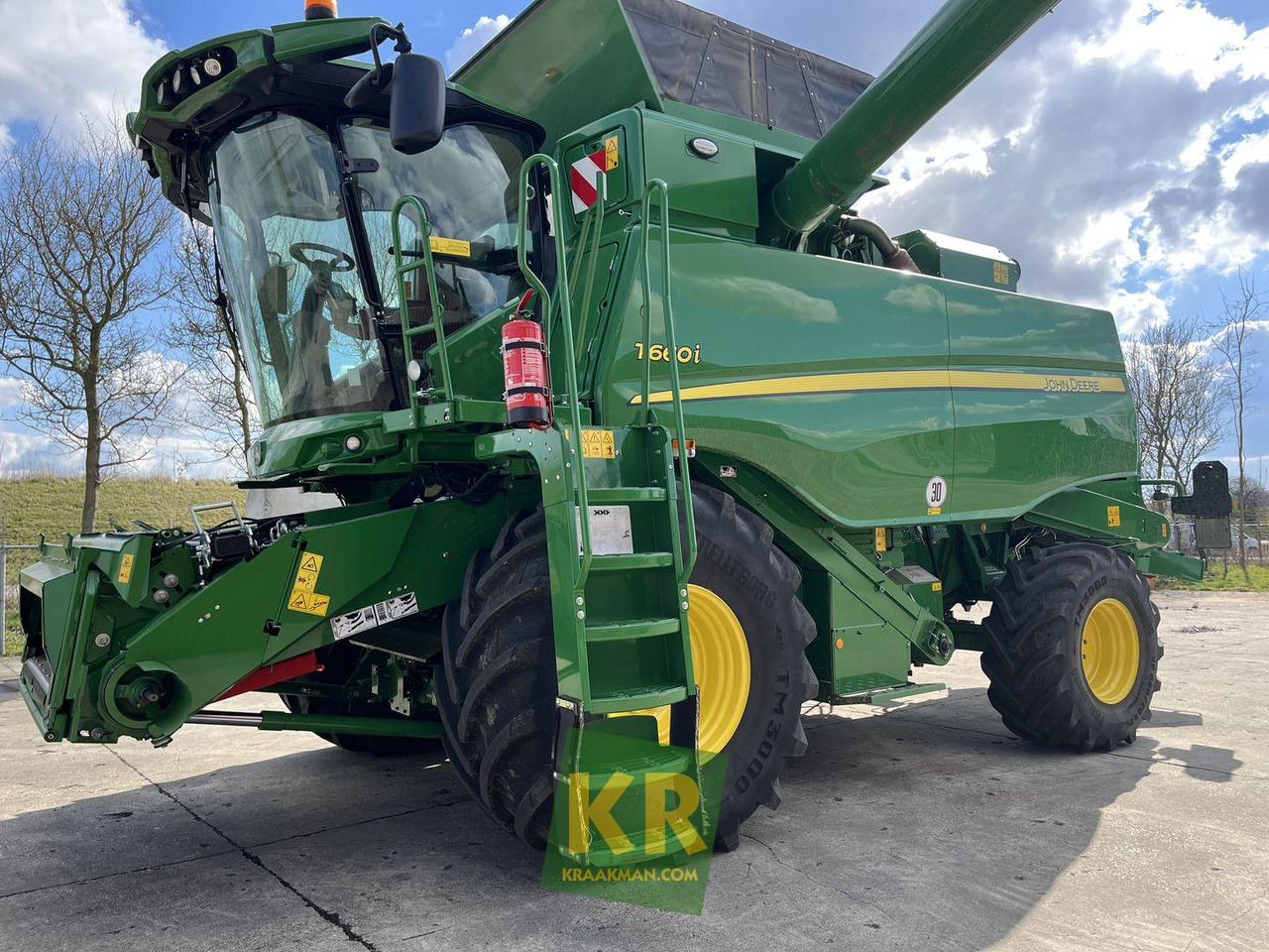 John Deere T660 - حصادة موحَّدة: صورة 1 John Deere T660 - حصادة موحَّدة: صورة 1