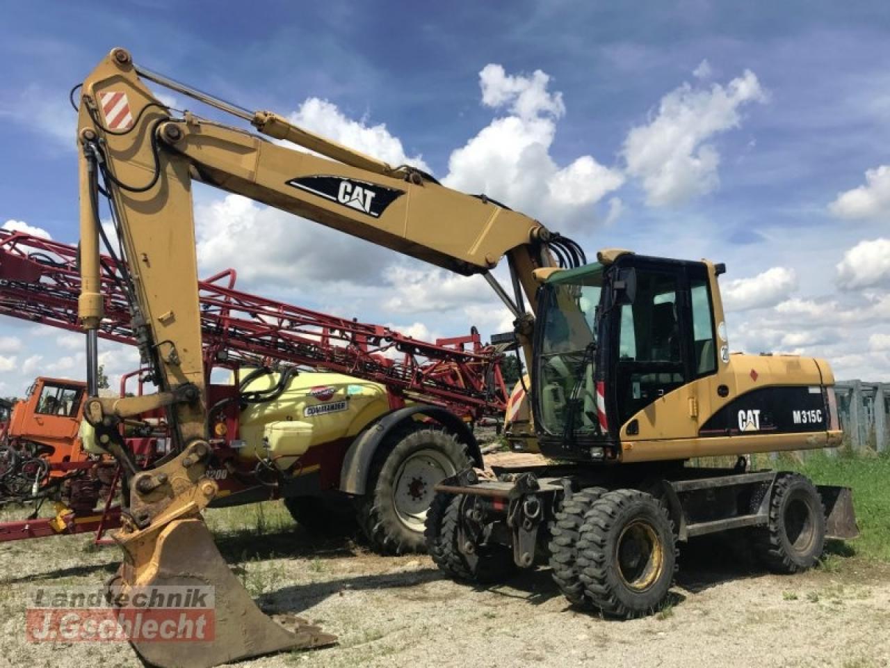 Caterpillar m 315c - حفارة دولاب: صورة 1 Caterpillar m 315c - حفارة دولاب: صورة 1