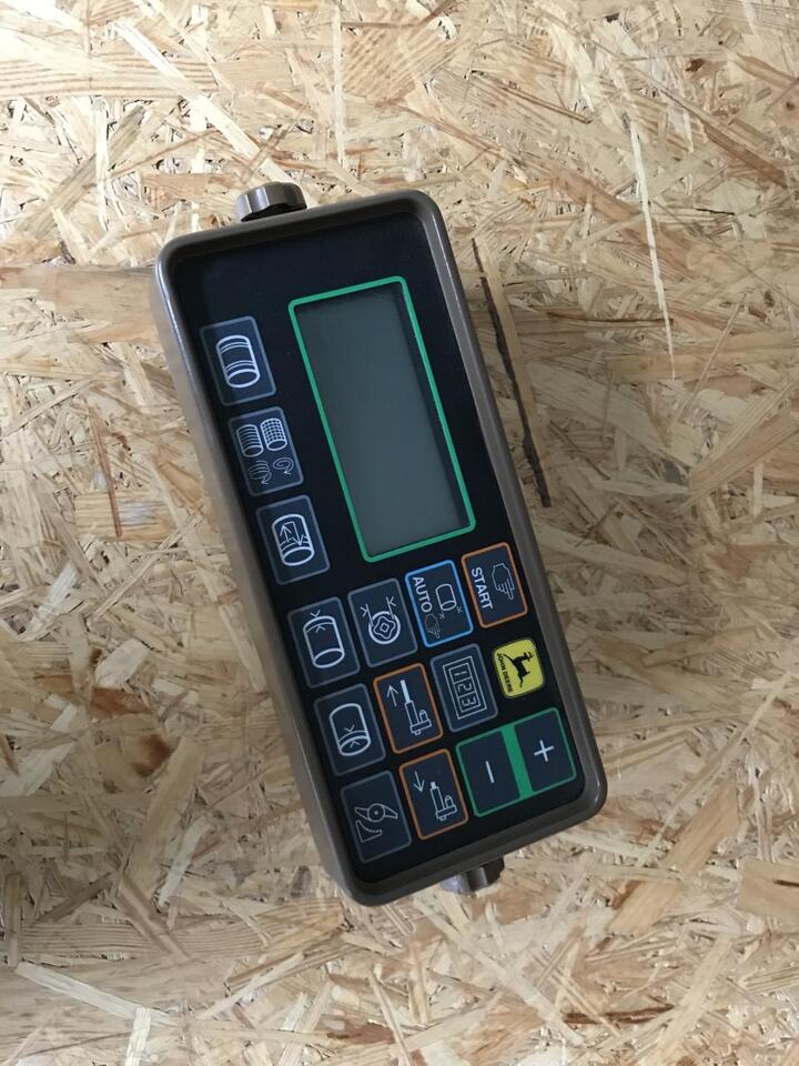 مكبس البالات المستطيله John Deere 590: صورة 10