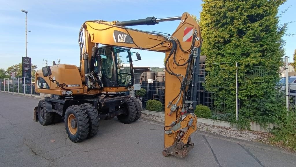 CAT M 316 D Schnellwechsler SMP 620, Klima, Reifen neu - حفارة دولاب: صورة 1 CAT M 316 D Schnellwechsler SMP 620, Klima, Reifen neu - حفارة دولاب: صورة 1