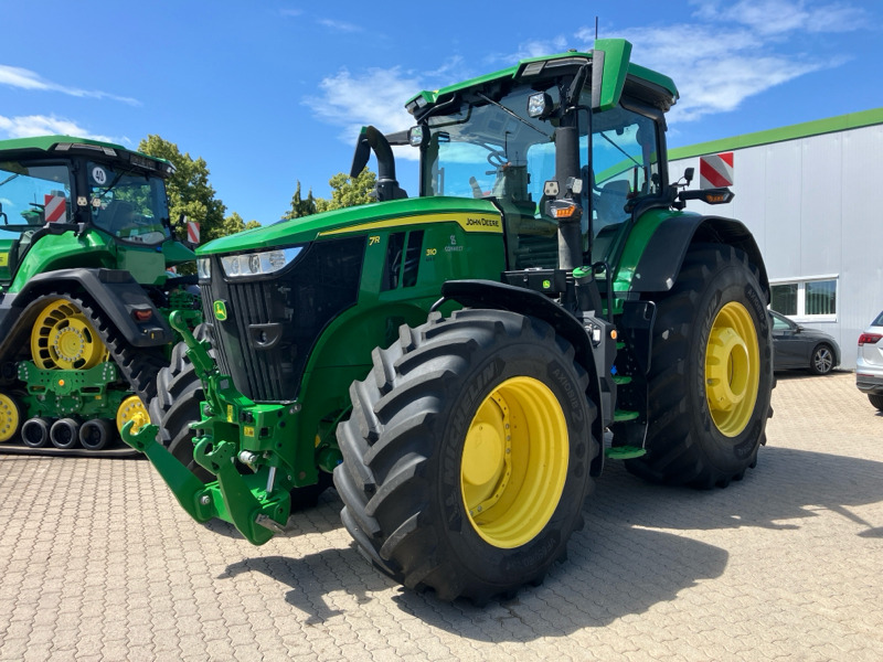 John Deere 7R310 mit PowerGard bis 02/27 - جرار: صورة 1 John Deere 7R310 mit PowerGard bis 02/27 - جرار: صورة 1