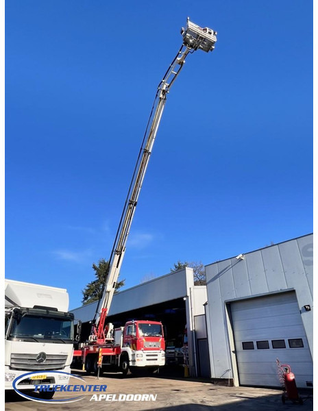 MAN TGA 26.350 Magirus ALP 320L = 32 meter, Waterpomp, 6x4, Bladgeveerd - سيارة إطفاء: صورة 1 MAN TGA 26.350 Magirus ALP 320L = 32 meter, Waterpomp, 6x4, Bladgeveerd - سيارة إطفاء: صورة 1