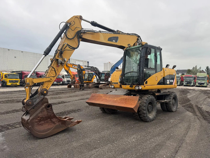 Caterpillar M313D 7212 HOURS - حفارة دولاب: صورة 4 Caterpillar M313D 7212 HOURS - حفارة دولاب: صورة 4