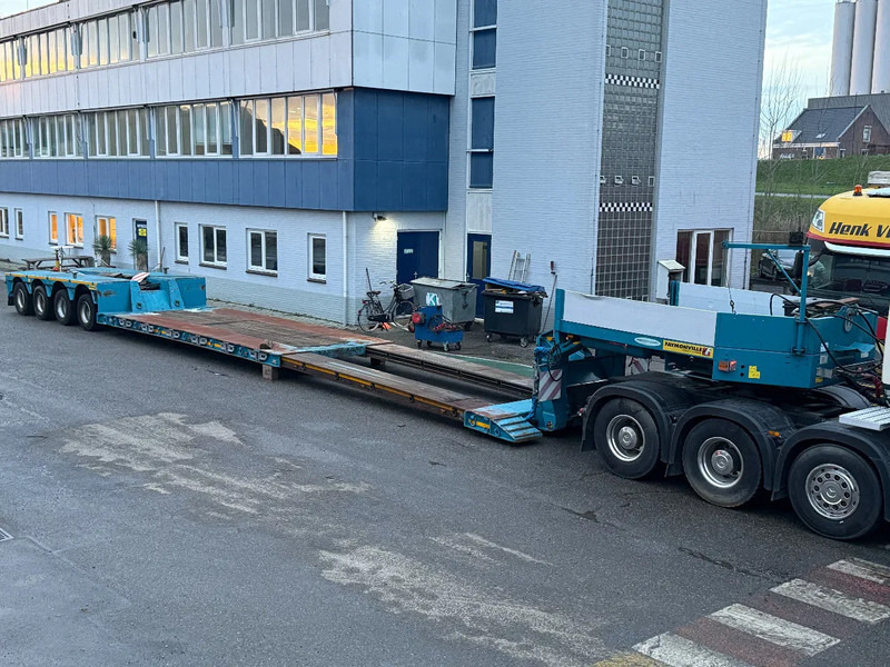 Faymonville STBZ-4VA - EXTENDABLE 5,00 METER - 4 AXLES FORCED STEERING - عربة منخفضة مسطحة نصف مقطورة: صورة 1 Faymonville STBZ-4VA - EXTENDABLE 5,00 METER - 4 AXLES FORCED STEERING - عربة منخفضة مسطحة نصف مقطورة: صورة 1