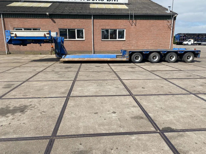 Goldhofer 4 AXEL STEERING - عربة منخفضة مسطحة نصف مقطورة: صورة 1 Goldhofer 4 AXEL STEERING - عربة منخفضة مسطحة نصف مقطورة: صورة 1