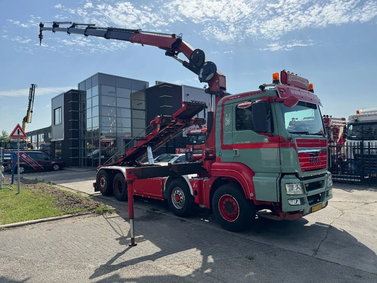 MAN TGS 35.480 8X4 HMF 2420 K5 + HMF ABLE + REMOTE C - شاحنة ذات خطاف, شاحنة كرين: صورة 1 MAN TGS 35.480 8X4 HMF 2420 K5 + HMF ABLE + REMOTE C - شاحنة ذات خطاف, شاحنة كرين: صورة 1