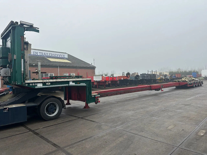 MEUSBURGER 4 axel steering, Double extendable up to 28 meters, extendable up to 3.2 meters, radio controlled, sliding roof - عربة منخفضة مسطحة نصف مقطورة: صورة 1 MEUSBURGER 4 axel steering, Double extendable up to 28 meters, extendable up to 3.2 meters, radio controlled, sliding roof - عربة منخفضة مسطحة نصف مقطورة: صورة 1