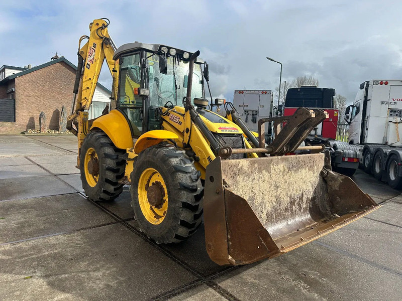 New Holland LB115B, CE, 240 MM MULTI PURPOSE LOADER BUCKET, 800 MM BACHOE DIGGING BUCKET, FLIP OVER FORKS, AIR CONDITIONER - جرافة حفار: صورة 5 New Holland LB115B, CE, 240 MM MULTI PURPOSE LOADER BUCKET, 800 MM BACHOE DIGGING BUCKET, FLIP OVER FORKS, AIR CONDITIONER - جرافة حفار: صورة 5
