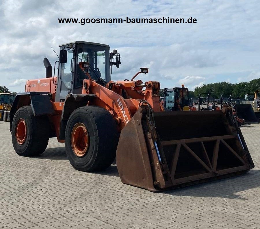 Hitachi LX 210 E - اللودر بعجل: صورة 1 Hitachi LX 210 E - اللودر بعجل: صورة 1