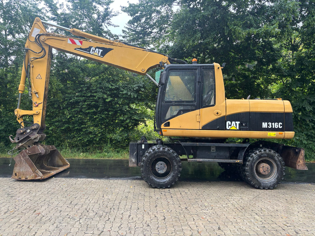 CATERPILLAR M 316 C - حفارة دولاب: صورة 1 CATERPILLAR M 316 C - حفارة دولاب: صورة 1