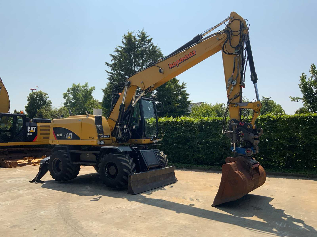 Caterpillar M316D - حفارة دولاب: صورة 2 Caterpillar M316D - حفارة دولاب: صورة 2