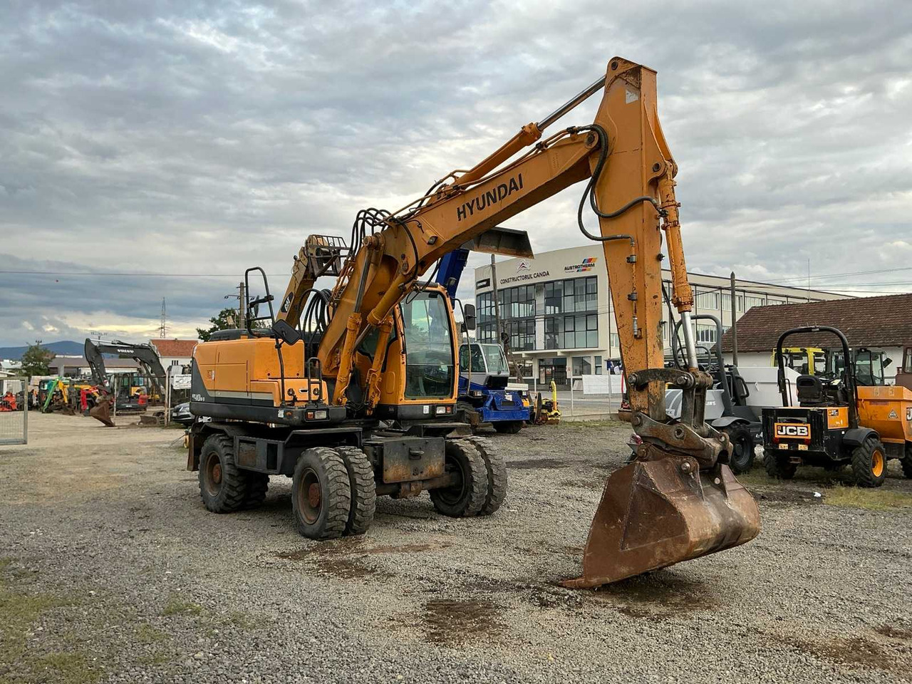 HYUNDAI ROBEX 140W-9 - حفارة دولاب: صورة 4 HYUNDAI ROBEX 140W-9 - حفارة دولاب: صورة 4