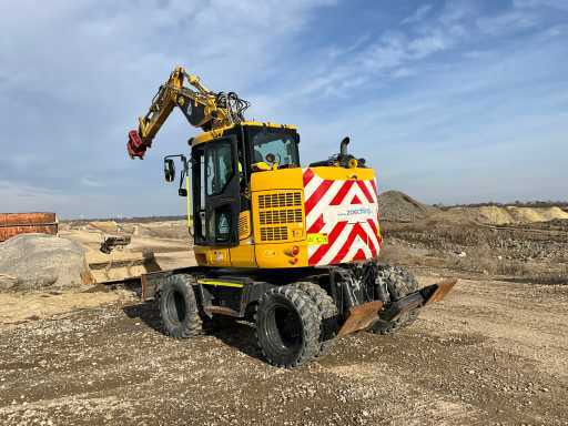 Komatsu PW118MR-11 - حفارة دولاب: صورة 2 Komatsu PW118MR-11 - حفارة دولاب: صورة 2