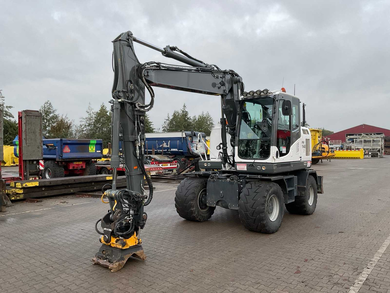 Komatsu PW148-10 - حفارة دولاب: صورة 2 Komatsu PW148-10 - حفارة دولاب: صورة 2