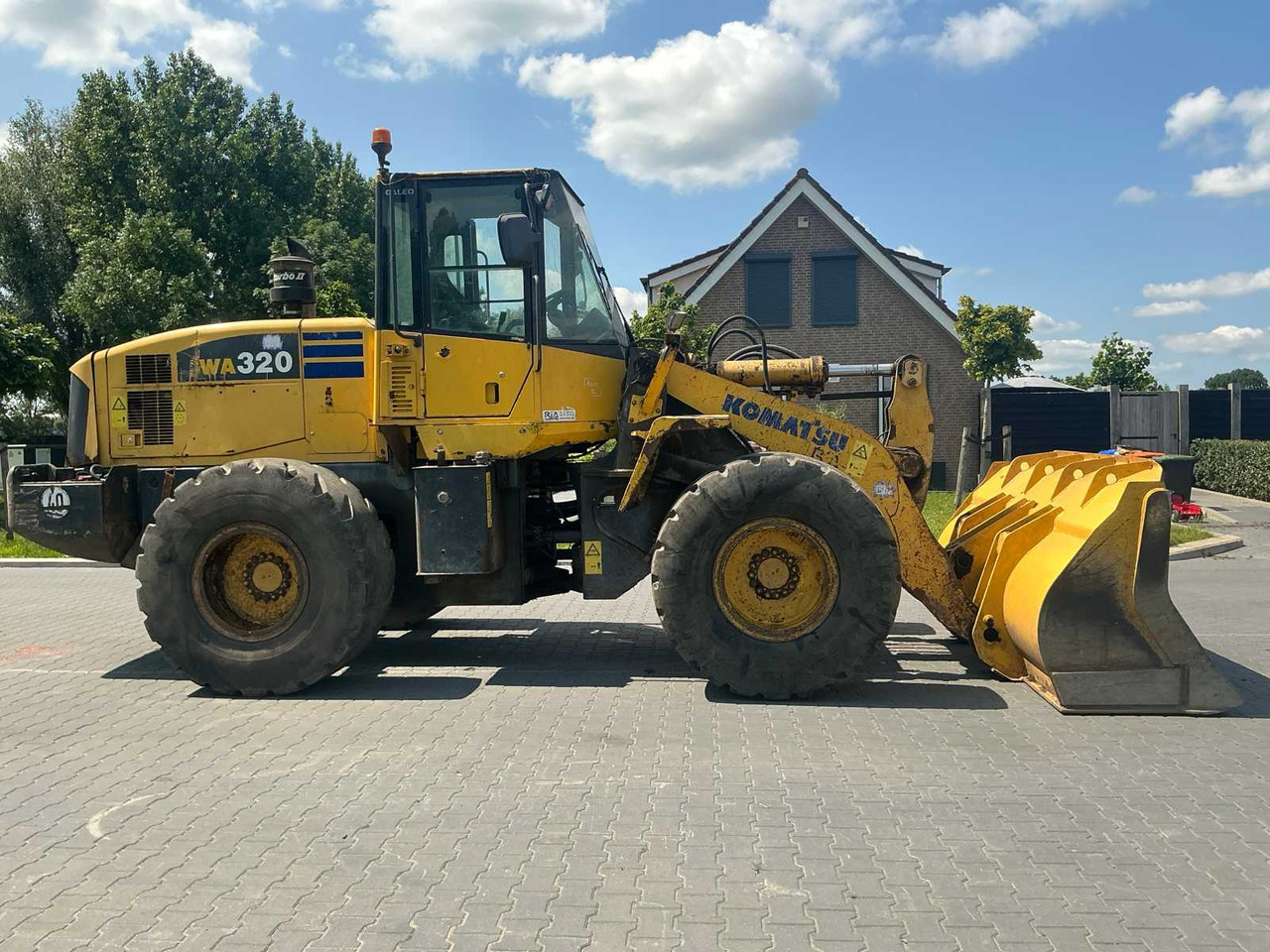 Komatsu WA320-5H - اللودر بعجل: صورة 4 Komatsu WA320-5H - اللودر بعجل: صورة 4